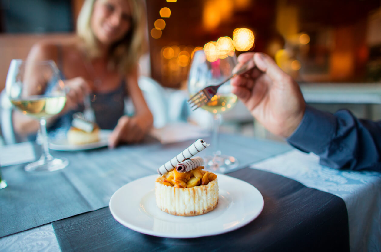 Small pudding with woman in background