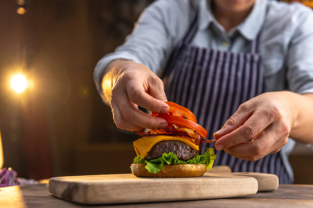 Chef making burger