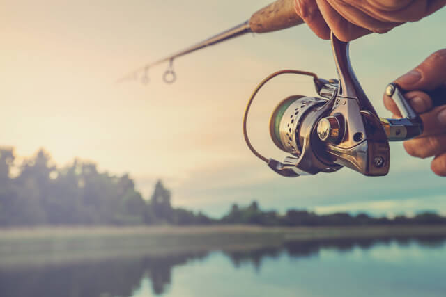 close up of a person fishing